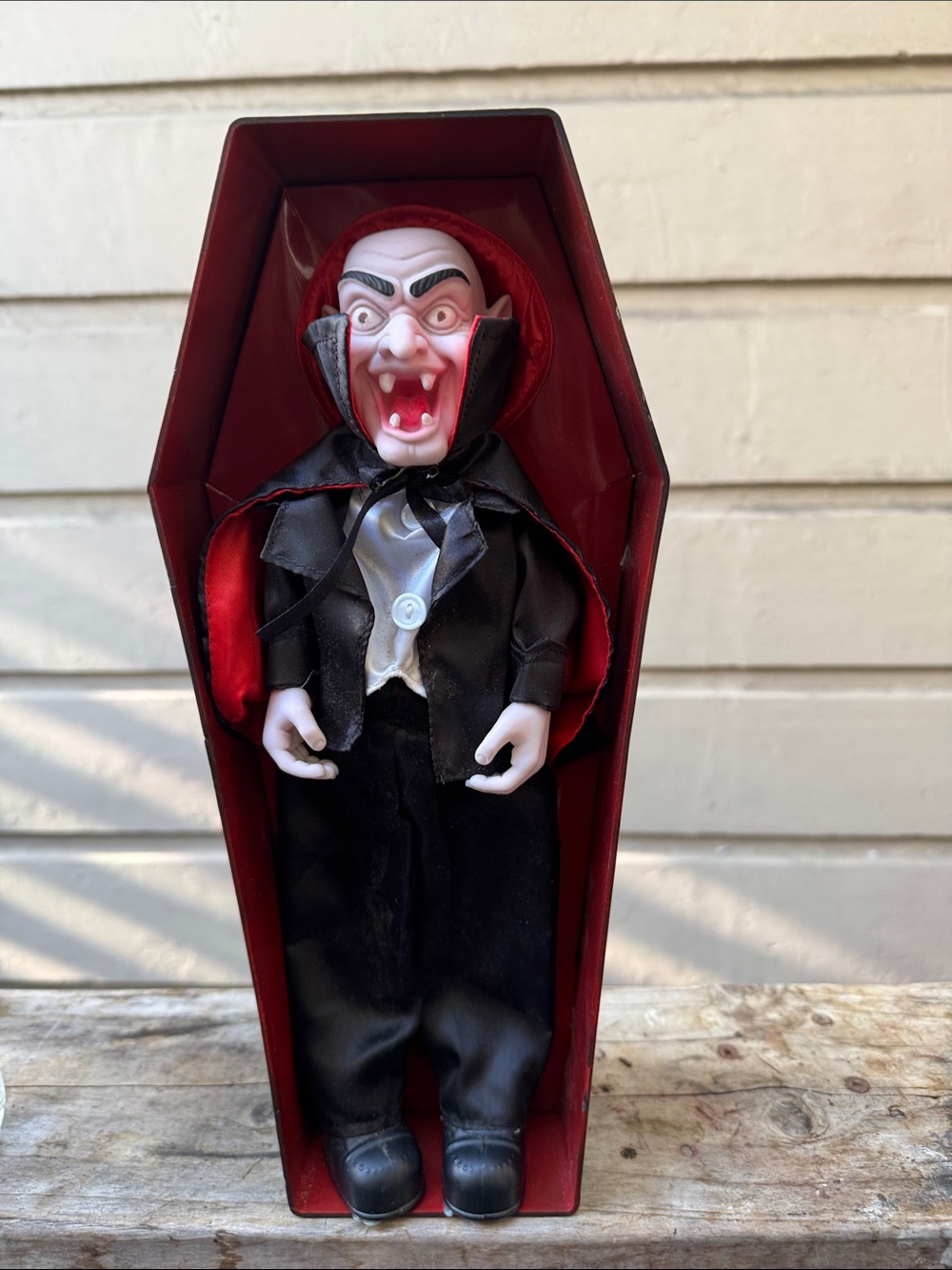 Vampire display doll in coffin.  Great Halloween decoration! Is not mechanical